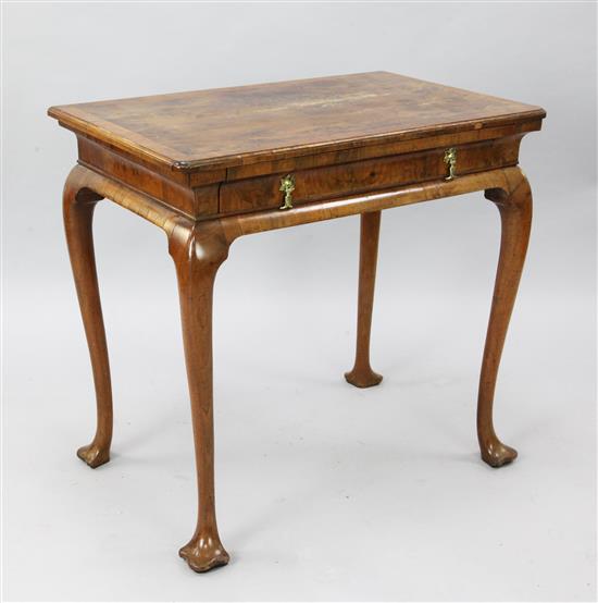 An early 18th century crossbanded walnut and yew lowboy, W.2ft 6in. D.1ft 7in. H.2ft 4in.